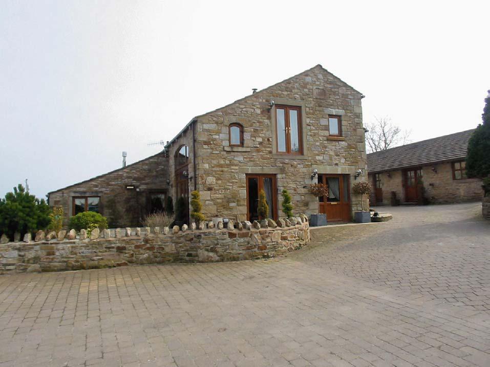 Hollins Barn Ightenhill Park Lane, Burnley. BB12 0RW Price: 550,000 Superb barn conversion with amazing views out to Pendle and as far as Noyna Top.