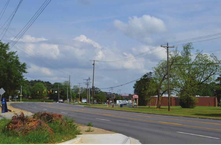 Andrews Road at the intersection with Old Bush River Road (Piney Grove Road in the distance)