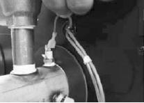 18 5. Feed green ground wire into boiler through the