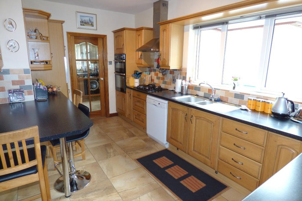 Kitchen: 15 2 x 9 10 (Max) with Oak eye and low level units including plate rack, wine rack, quad displays,