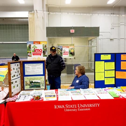Chris Sedrel & Megan Garrels at attended display Lavon Yeggy & Megan Garrels answering questions from health fair visitor Mike Murphy & Sharon Jeter staffing the attended display