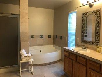 1. Location Materials: Bedroom Master Bathroom 2. Room Ceiling and walls are in good condition overall. Accessible outlets operate. Light fixture operates.