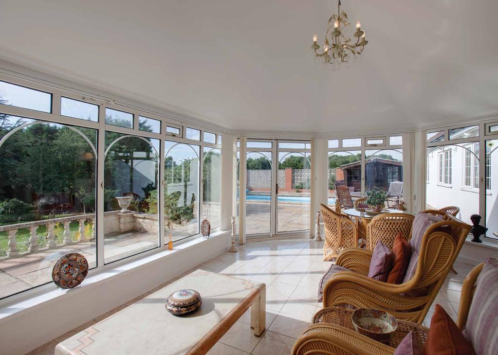 Sun Room 21 x 15 10 (6.4m x 4.8m) A pleasant room to relax and enjoy the superb view of the rear garden and sun terraces.