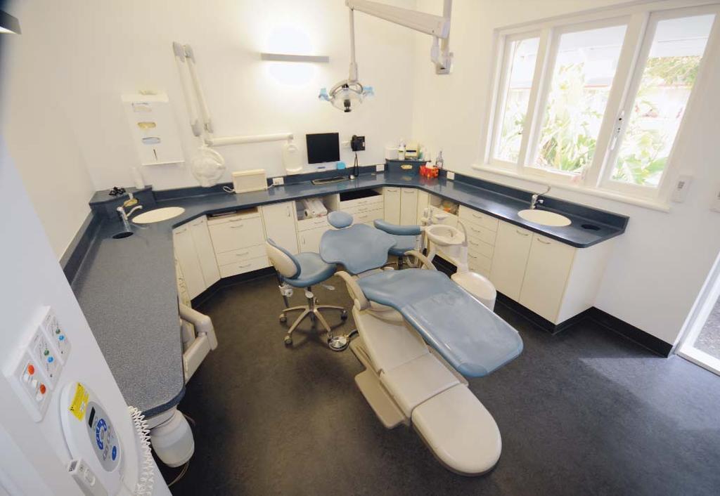 A key feature of the surgery design is wrap-around cabinetry and wall-mounted dental units, which keep instruments and consumables close at hand when required, but