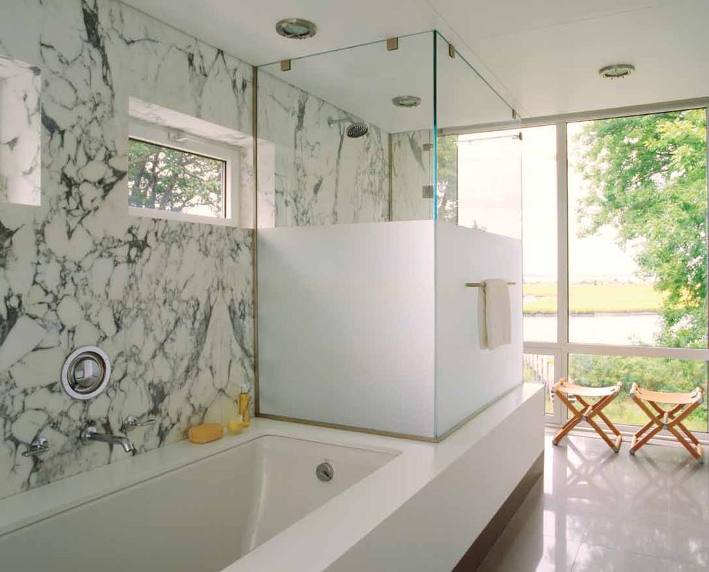 A bath by Shelton Mindel & ASSOCIATES features WATERWORKS surfaces, fixtures and accessories THAT