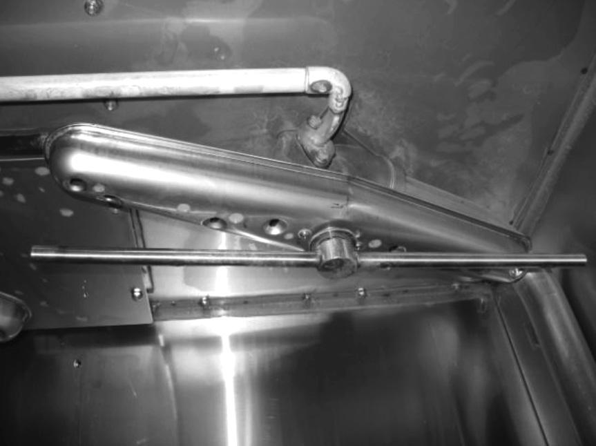 The wash and rinse arms are easily removed for cleaning. To remove upper, low water rinse arm and wash arm (Fig. 6): Unscrew the rinse arm by loosening the knurled ring at top of rinse arm.