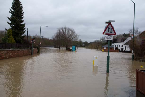 Policy: development will not be permitted within designated flood water containment areas in the River Stour flood plain.