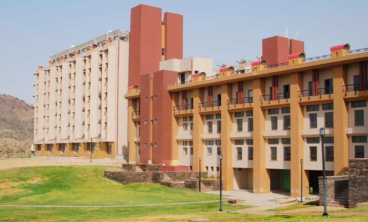 Deciphering Green Architecture Moving Towards Sustainable Campus Design Projects: NIIT University Campus, Neemrana and Indian Institute of Technology, Gandhinagar Architects: Space Design