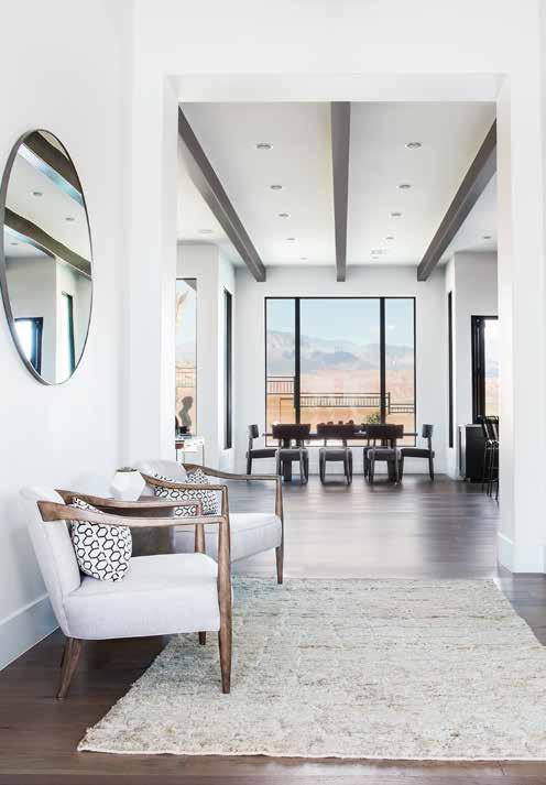 ABOVE: Lofty 15-foot-high ceilings give the entry a grand, spacious ambiance.