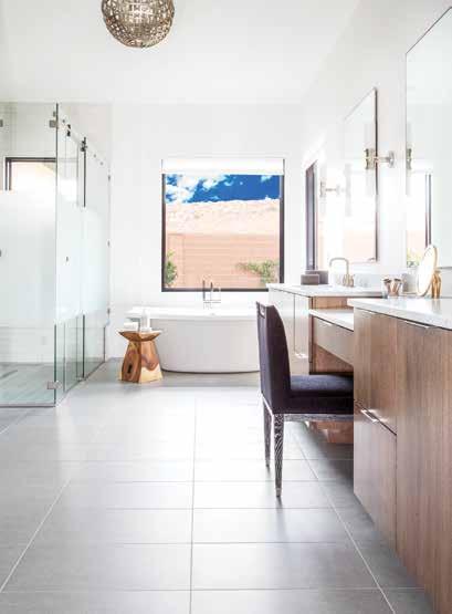 TOP RIGHT: A shapely freestanding tub performs like sculpture in the master bathroom.