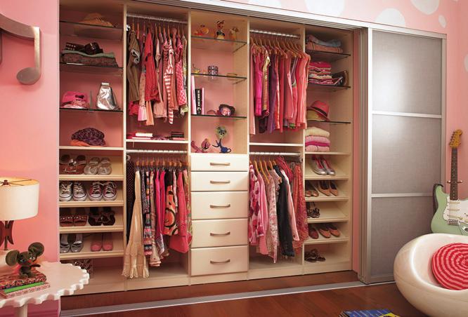 16 17 Bedroom reach-in closet in Ivory featuring