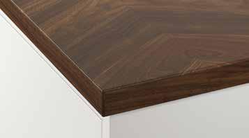 SOLID WOOD AND THIN-LAYER WOOD COUNTERTOPS Wood countertops Walnut The natural color and grain of wood adds warmth to your kitchen decor. Walnut gets lighter in color with age.