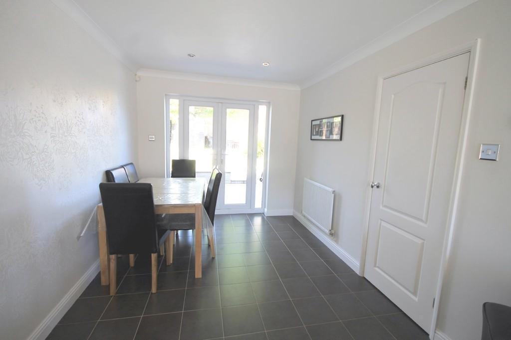 REAR LOBBY Patterned double glazed door to rear leading to rear garden, radiator, porcelain tiled flooring, smoothed ceiling, door giving access to: GROUND FLOOR WC Matching fitted contemporary white