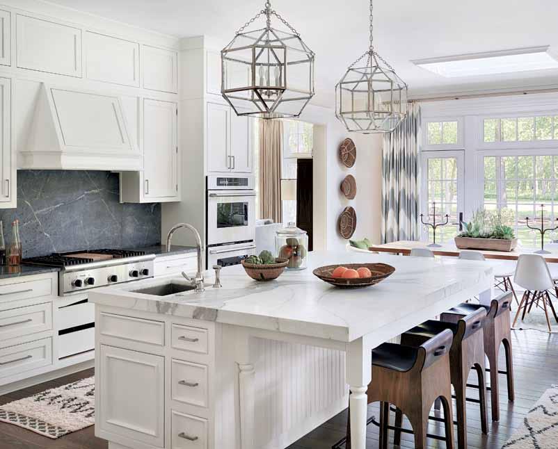 Stools from Jayson Home allow the kitchen s center island to be used for additional seating.