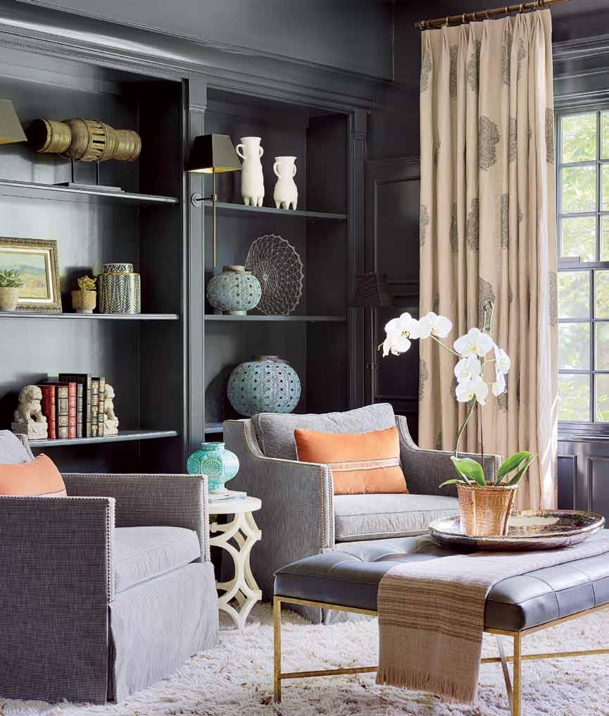 c o n t i n u e d f r o m p a g e 2 4 8 by Benjamin Moore and arranged the shelving with a carefully selected assemblage of photos, Asian pottery and rustic planters.