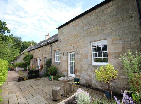Number 5 is positioned to the rear of the courtyard and enjoys a wonderful peaceful location with all accommodation overlooking the secluded garden.