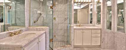 Marble floor His and hers vanities with marble countertops Large soaker tub