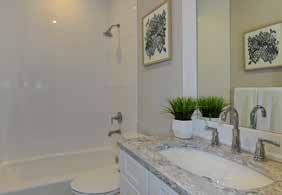 3 (2nd Floor) Porcelain tile floor Solid-wood vanity with granite top and undermount sink