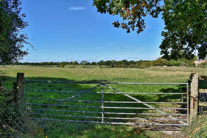 Approached via a long sweeping driveway leading to both the property, land and barn.