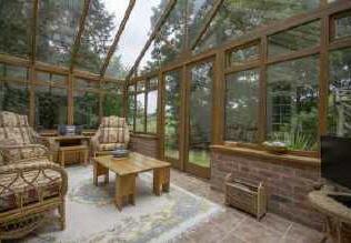2m (9'5" x 17'1") The light and airy conservatory has tiled flooring and