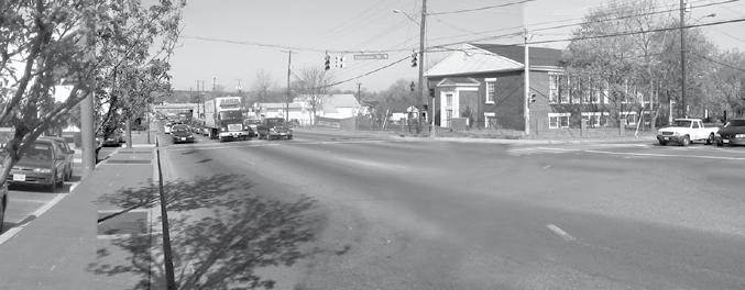 Before Annapolis Road at intersection with Edmonston Road looking west. After Policy 1: Encourage the construction and rehabilitation of residential units along Annapolis Road.