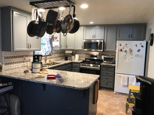 1. Kitchen Room Kitchen Walls and ceilings appear in good condition overall. Flooring is Tile. Heat register present. Accessible outlets operate. Light fixture operates.