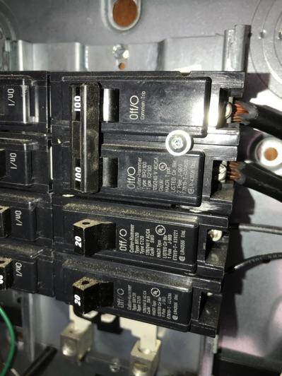Observations: Circuit breakers missing exposing live electrical conductors. Electrocution hazard.
