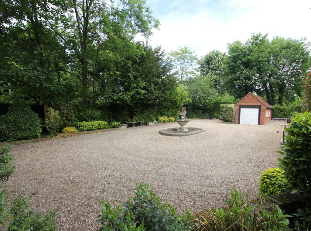 style and quality located in substantial landscaped grounds approaching 1.