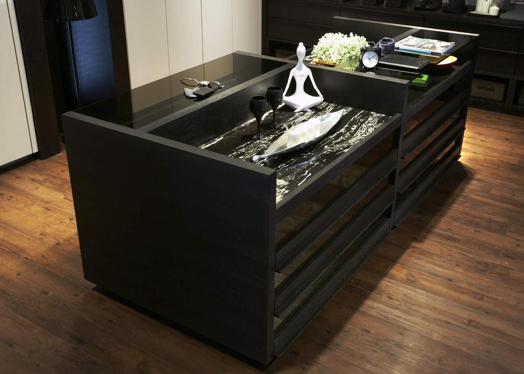 Portoro platinum marble together with black tinted glass form the top