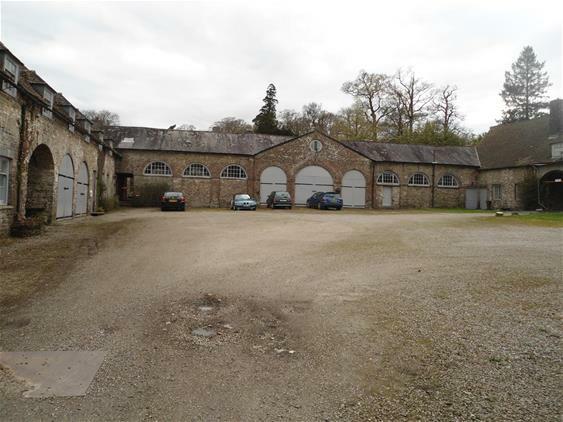 former stables located within the courtyard