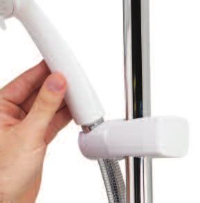 2 To select the preferred height for the shower head, rotate the handset holder knob to