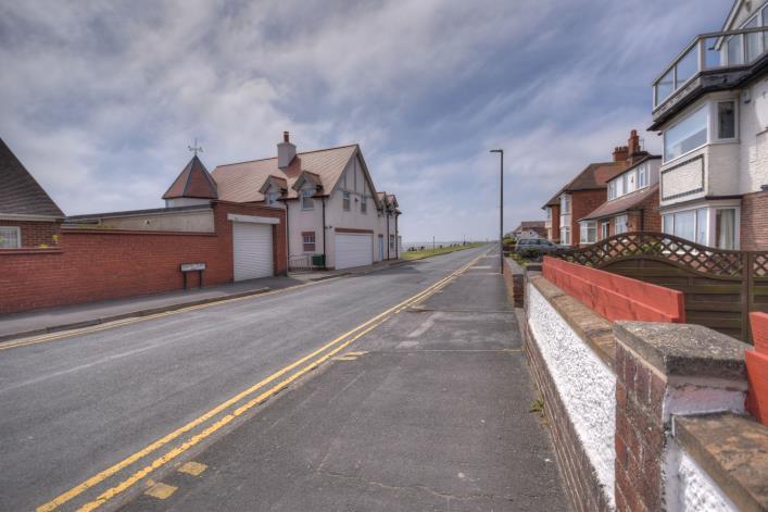 Extensively improved and maintained to a high standard, this beautiful property is enviably positioned in breathtaking proximity to the front and enjoys sea views on