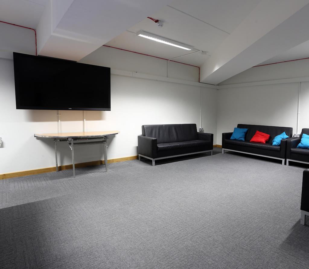 Joe McQuaide Room Basement Multi-purpose space with a capacity of 60 people.