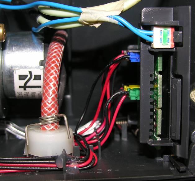 Heater connector Fastening screws Hose clip Fig.