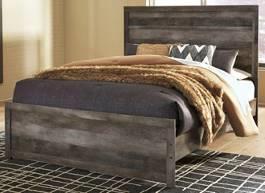 bed has upholstered headboard panel with horizontal channel details Large scaled bed option features a crossbuck design Dressing chest with