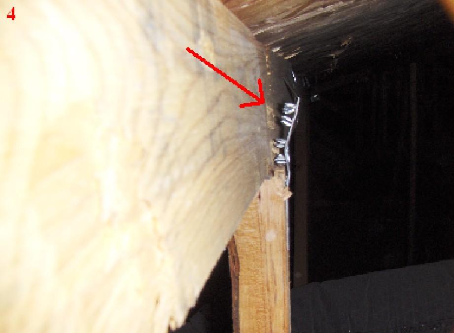 There is a cut roof trust at the northwest area of the attic.