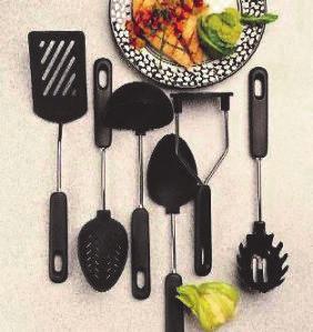 Tools / Utensils Item# 1604 7 Piece Nylon Tool Set Includes: spatula, slotted spoon, ladle, solid spoon, masher, spaghetti server and tool rack. Dishwasher Safe UPC: 0-21614-00734-6 Cube: 1.