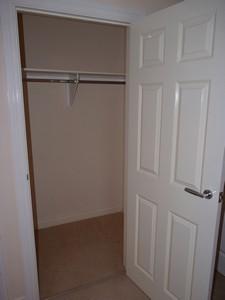 hooks, shelf, rail, painted walls and carpet to