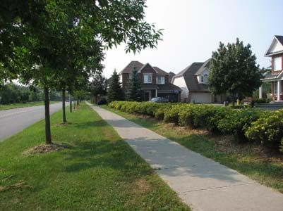 Guideline 24: Plan development based on rear lanes or rear parking areas at important neighbourhood focal points such as
