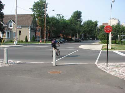 Figure 32a: This pathway intersects the sidewalk at an intersection and crosswalk Figure 31b: While all roads should