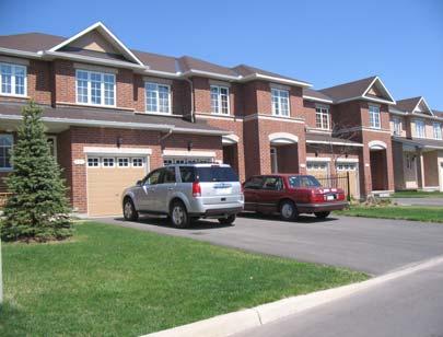 Figure 44b: Limiting the width of garages and driveways balances the proportions of the front façade and
