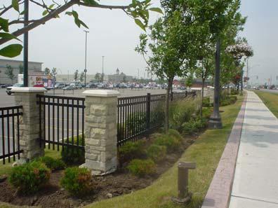 Buffers may include low shrubs, trees, and decorative fences.