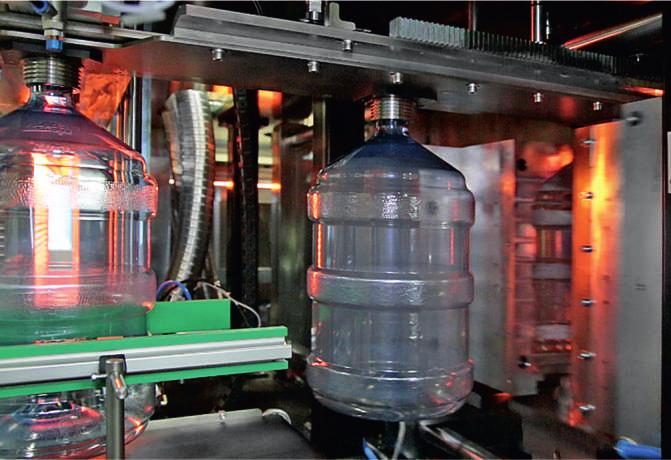 Heated preforms are transported to a blowing mould, when the mould is closed the bottles are blown in a two stage process: pre-blow (pressure 7BAR) and main blow (pressure 25-30BAR).