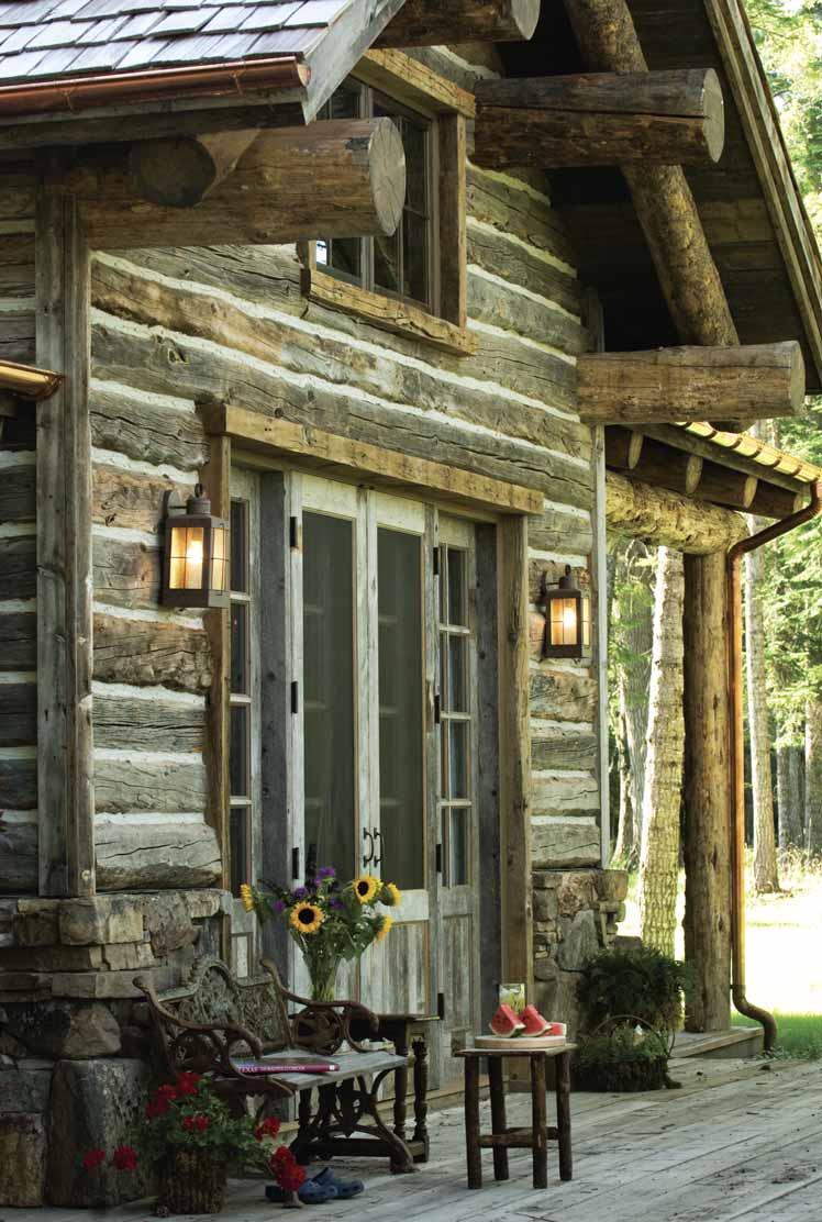THIS PAGE & OPPOSITE: A mix of reclaimed exterior finishes from fieldstone and cedar shakes to barn wood and log siding gives the cabin an aged appearance.