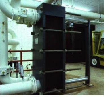 Figure 9 Water Cooled Chiller System with Open Circuit Cooling Tower + Plate & Frame Combination The heat exchanger is typically located in an equipment room and as such does not need glycol for