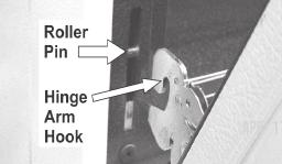 Pull the door hinge locks on both left and right door hinges down from the oven frame completely towards the oven door (See Fig. 2). A tool such as a small flat-blade screwdriver may be required. 3.