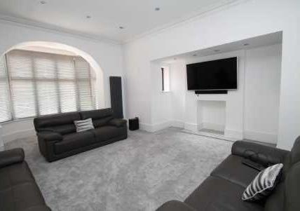 radiators, double glazed bay window to front, picture window to rear. Front Sitting Room 24'11" 18'9" (7.59m 5.