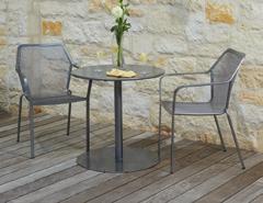 Finely crafted from cast aluminum and shown in a Hammered Pewter finish, the collection includes seating and dining options, all classically inspired with Old World