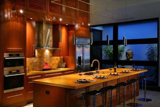 Crafted of rich African mahogany, the precision-designed and executed multi-tasking piece has pure down covered comfort, strategically placed lighting, luxury plumbing fixtures, and volumes of