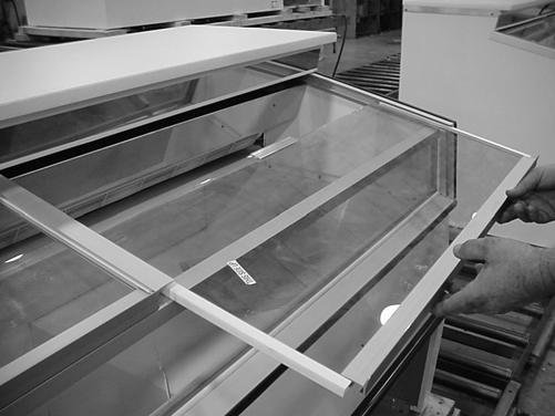 Top Deck Glass Lid and Top Deck Removal Price Tag To remove the glass lid, start in the closed position and lift up on the front extrusion. Pull the glass lid towards you to remove it from the track.